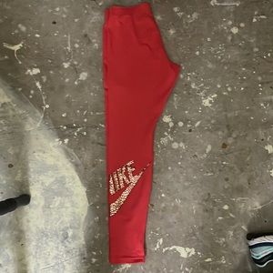 coral and gold Nike Leggings